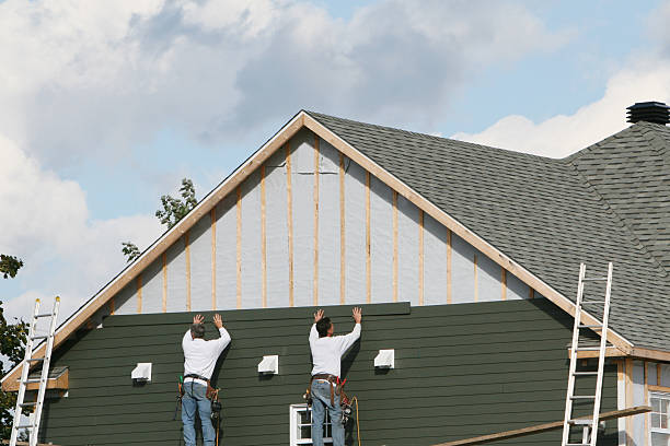 Professional Siding Replacement technician working in Belle Haven, VA